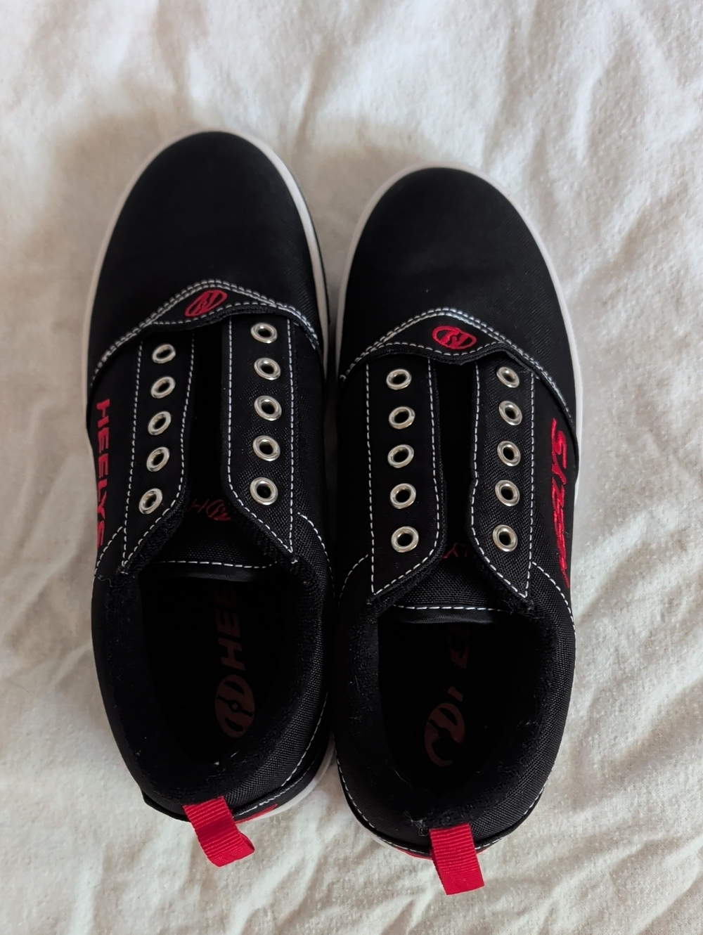 Heelys Men's Black Skate-Style Slip-On Shoes with Red Accents